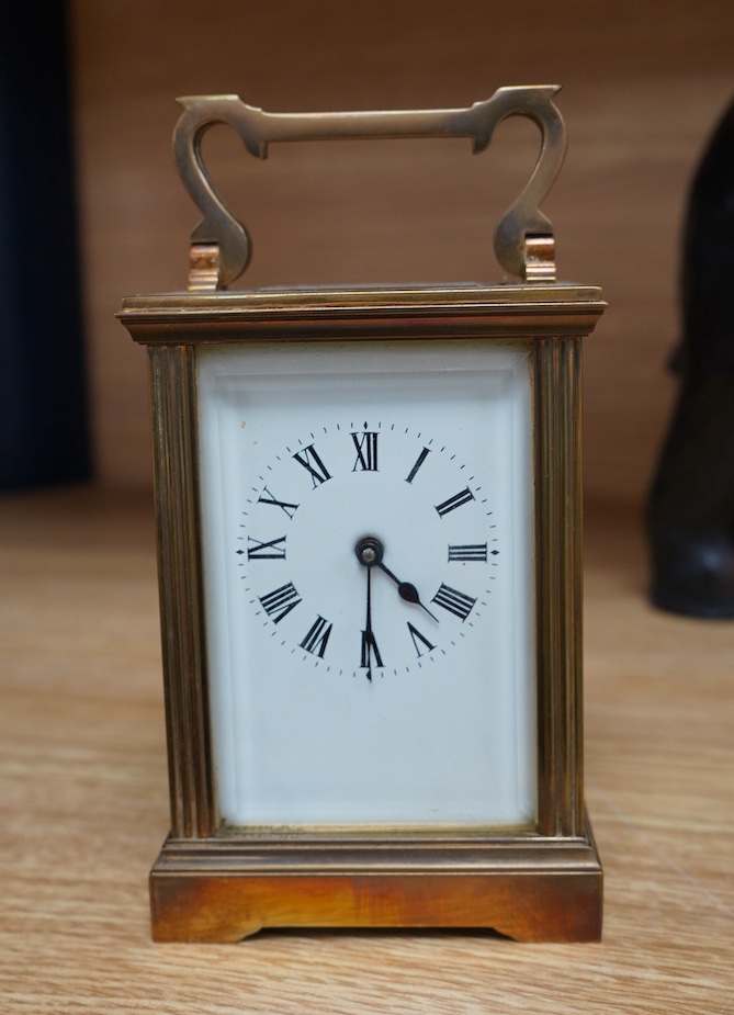 A French eight day carriage timepiece, 11.5cm high. Condition - fair to good.